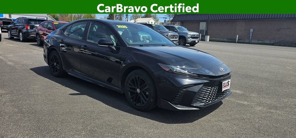 2025 Toyota Camry SE in Black — front three-quarter view